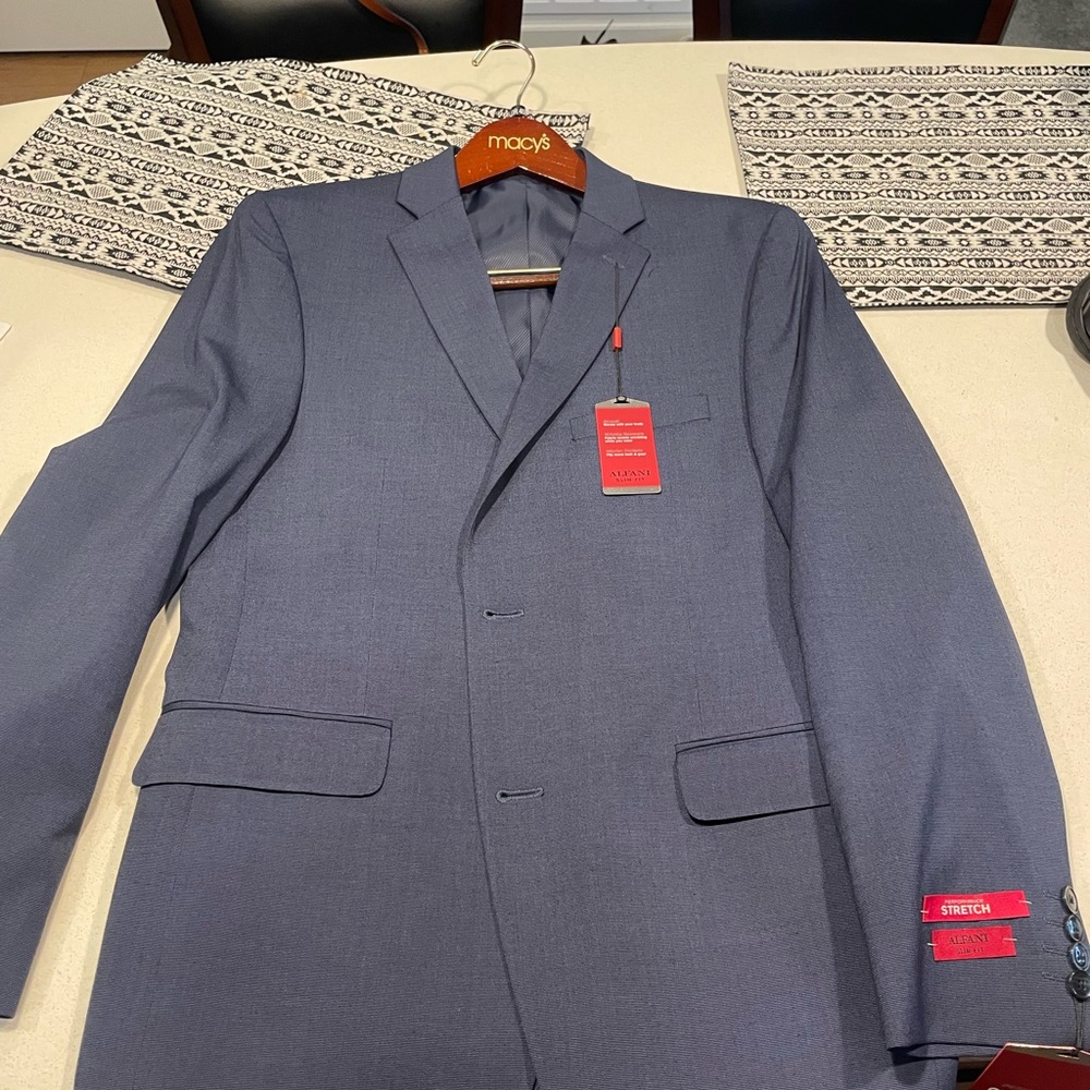Alfani slim fit suit jacket and pants . Jacket size 40R and pants 30/32.